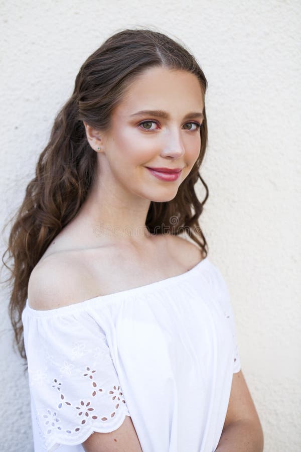 Portrait close up of young beautiful brunette woman