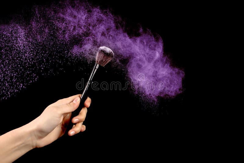 Vibrant Beauty: Makeup Brush with Purple Powder Explosion