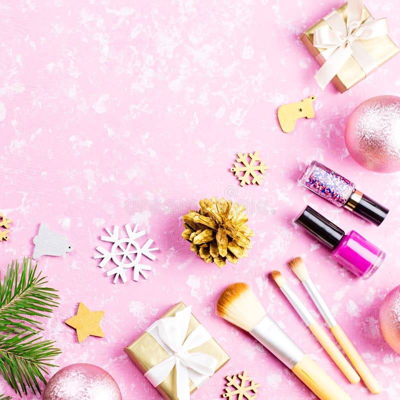 Make Up Cosmetics, Presents and Christmas Decorations on Artistic Pink ...
