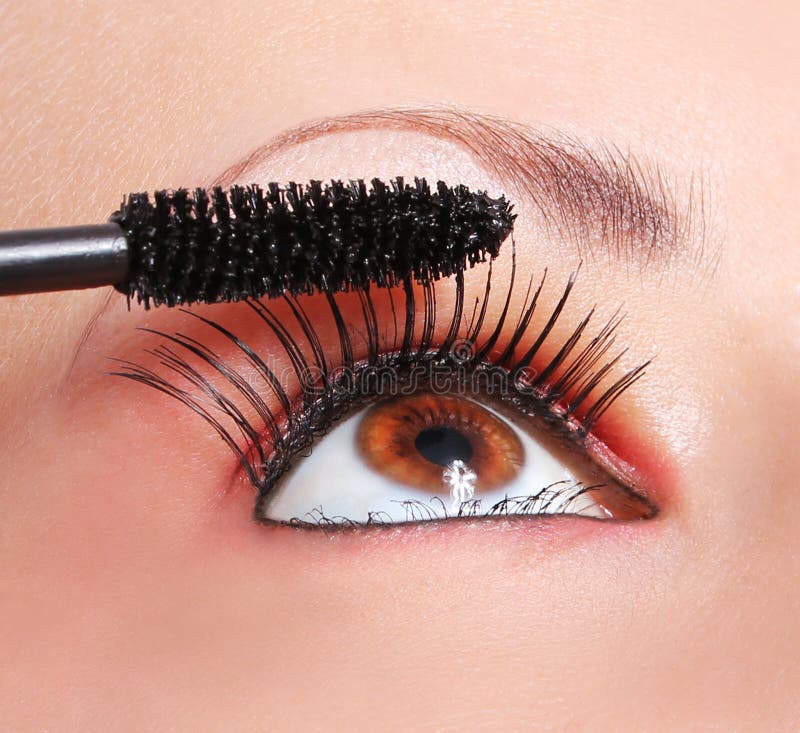 Makeup. Applying Mascara stock photo. Image of lashes 25698108
