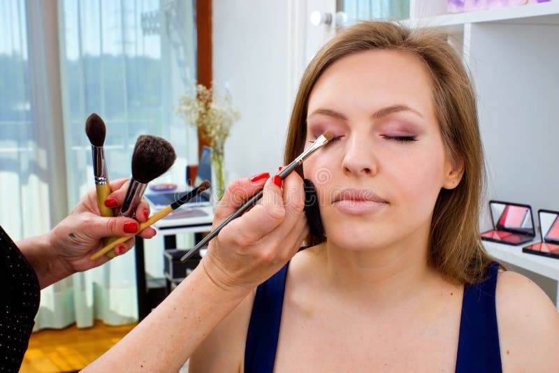 Makeup Artist Applying Eyeshadow on Womans Eyes Stock Image Image of