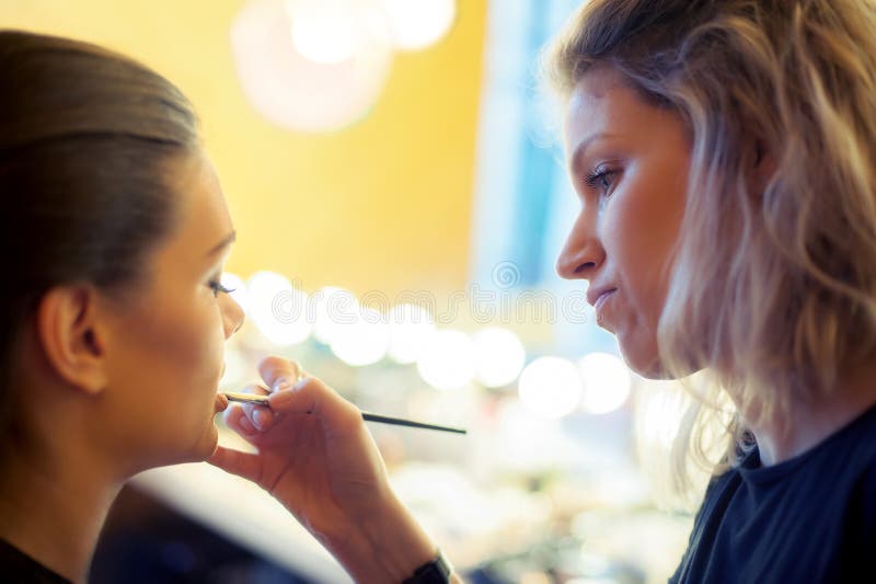 Makeup Artist Applying Lipstick Stock Image Image of design, fashion