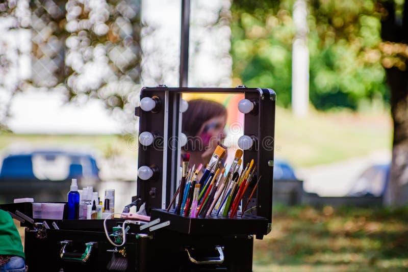 Makeup Artist with Professional Mobile Dialing. Set of Makeup Brushes