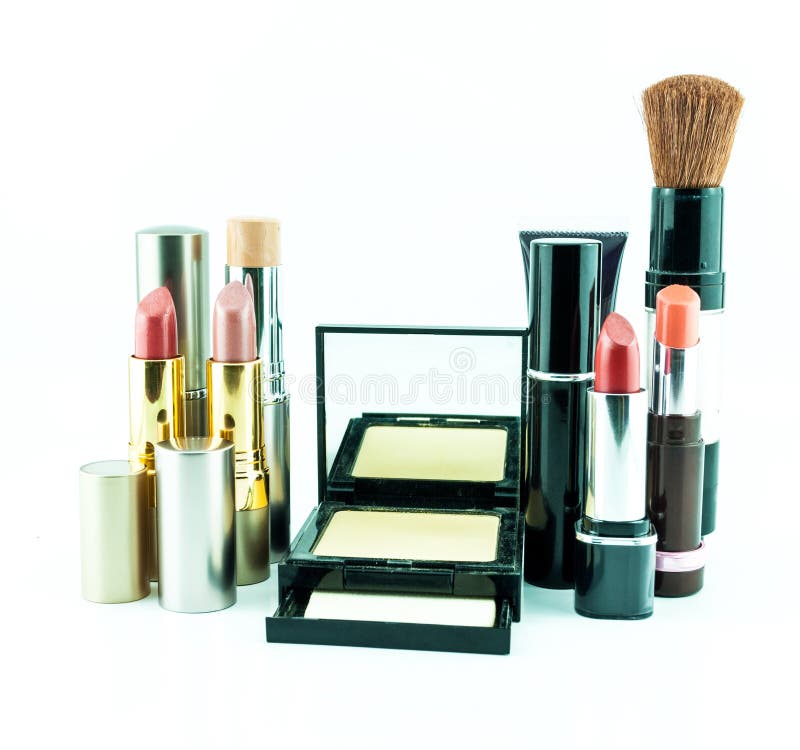 Makeup brush and cosmetics set on a white background