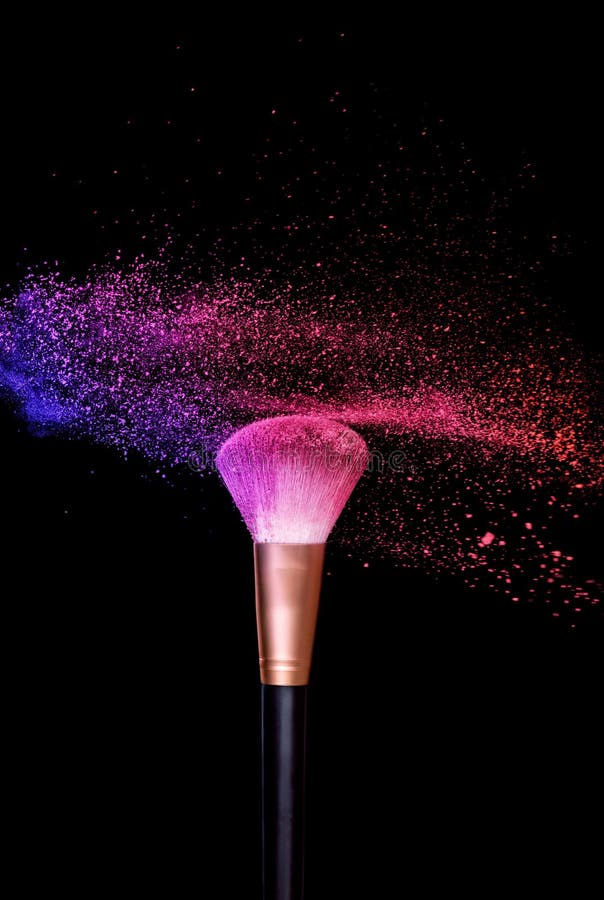 Explosion of Blue Pink Colored Powder Isolated on Black Background.Pink