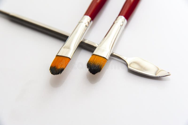 Makeup brushes and spatula stock image. Image of skincare 38227765