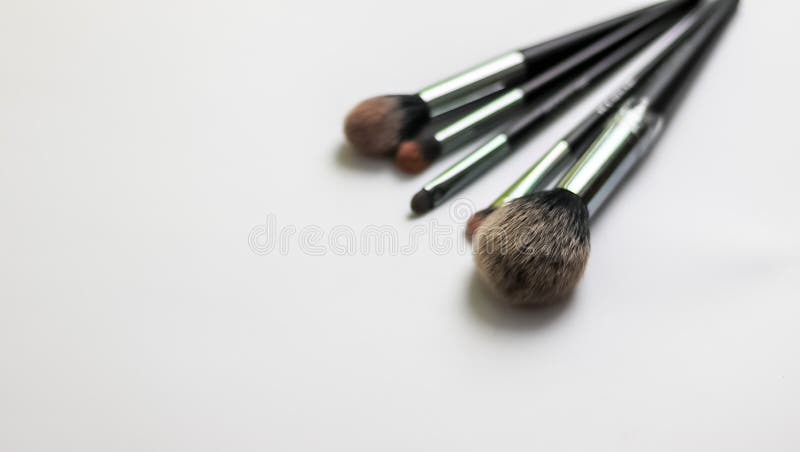 makeup brushes on white background, beauty salons concept, skin care