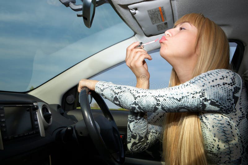 Makeup in car stock image. Image of lips, female 5372049