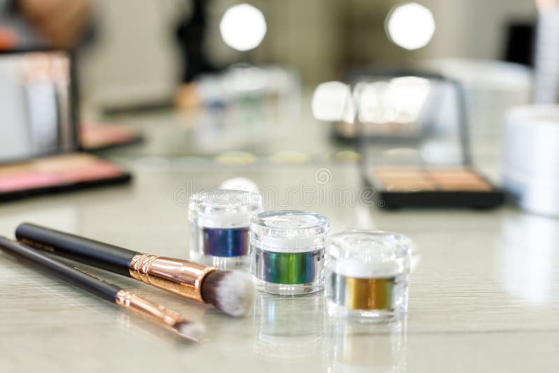 Makeup Kit in Front of a Mirror in a Beauty Salon Stock Photo Image