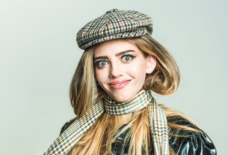 Makeup look for woman with soft skin. Autumn fashion for woman in hat and scarf. Trendy girl with makeup on sensual face stock photos Makeup look for woman with soft skin. Autumn fashion for woman in hat and scarf. Trendy girl with makeup on sensual face stock photos