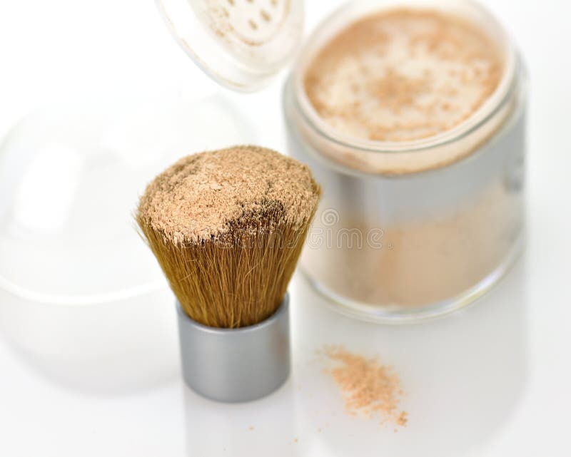 Makeup powder and brush royalty free stock photos