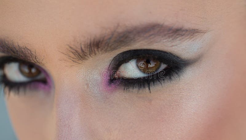Makeup for woman with soft skin, youth. Woman with eye make up look. Fashion look of stylish girl, makeup trend royalty free stock photo Makeup for woman with soft skin, youth. Woman with eye make up look. Fashion look of stylish girl, makeup trend royalty free stock photo