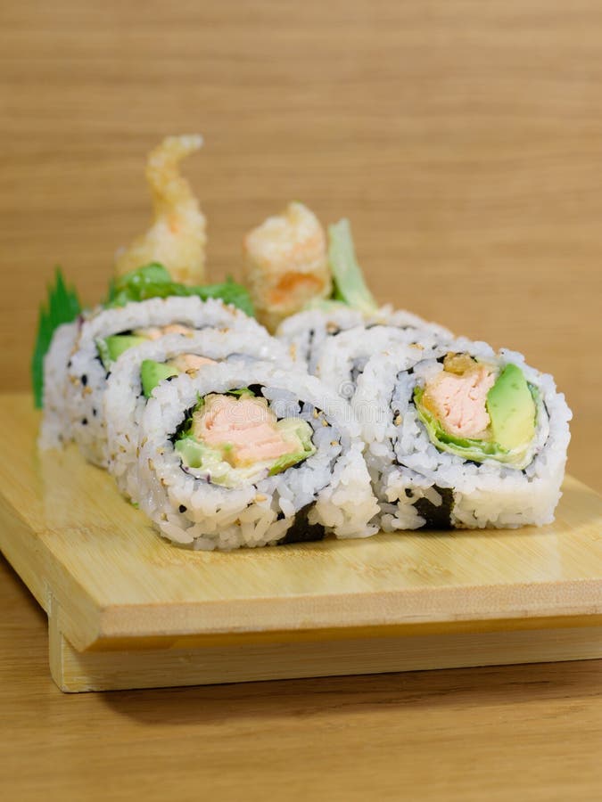 Maki roll with shrimps fried, avocado and lattuce