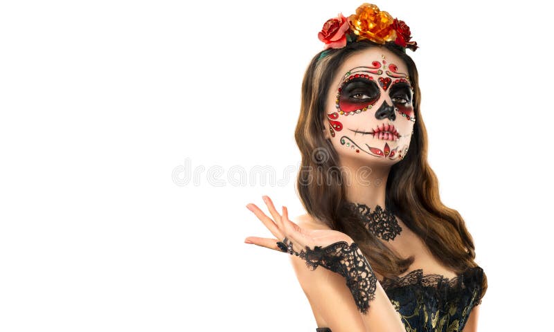 Sugar skull makeup. Halloween party, traditional Mexican carnival, Santa Muerte. Beautiful young woman costume, painted face. Isolated on white background. Sugar skull makeup. Halloween party, traditional Mexican carnival, Santa Muerte. Beautiful young woman costume, painted face. Isolated on white background