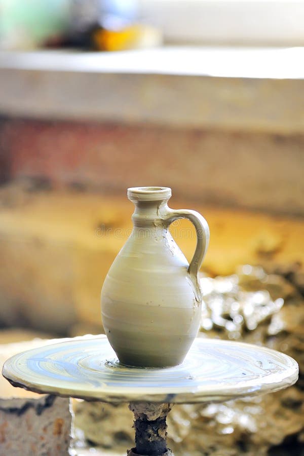 Making of a ceramic vase inside of workshop