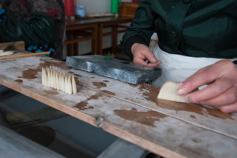 Making Chinese Writing Brush Stock Photo Image of oriental, glasses