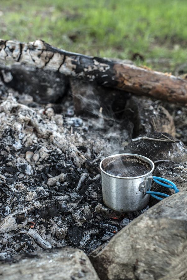 Making coffee on campfire stock image. Image of natural 137909383