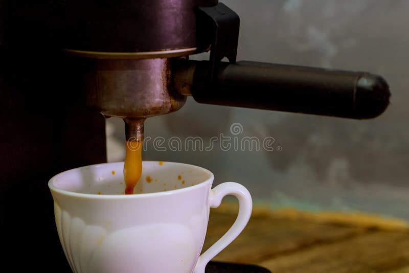 Making a Coffee Cup Machine Espresso . Process of Preparation of Coffee