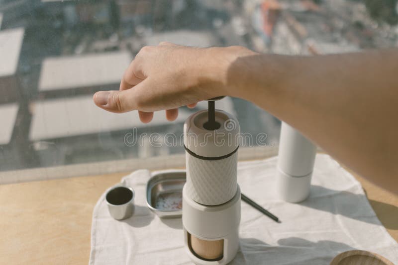 Making Espresso by Pressing Coffee. Happy Morning Routine. Stock Image
