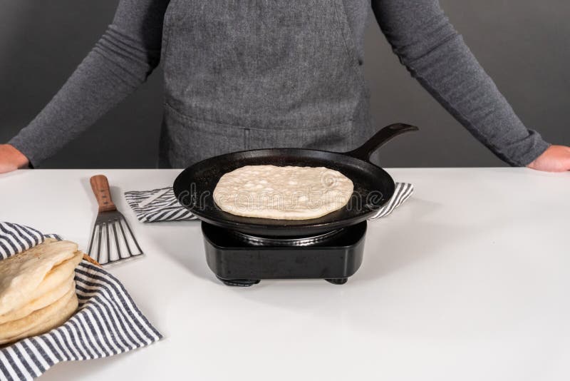 Making flatbread stock image. Image of black, homemade 278415309