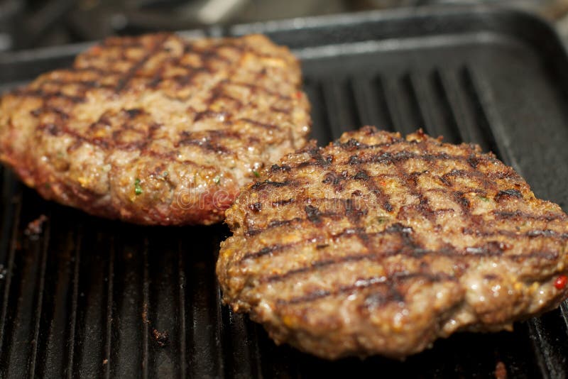 Making a grilled hamburger stock image. Image of hamburger 36613425