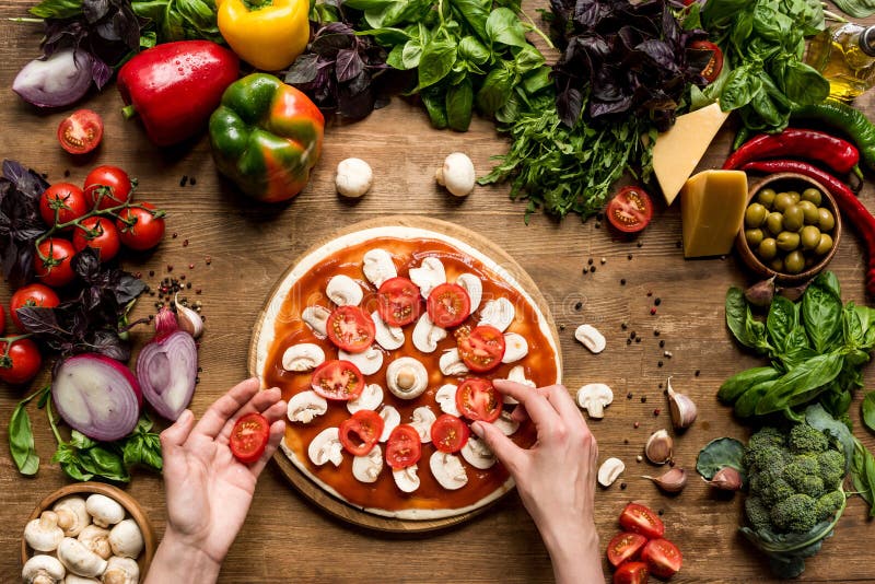 Making homemade pizza with fresh ingredients stock photography Making homemade pizza with fresh ingredients stock photography