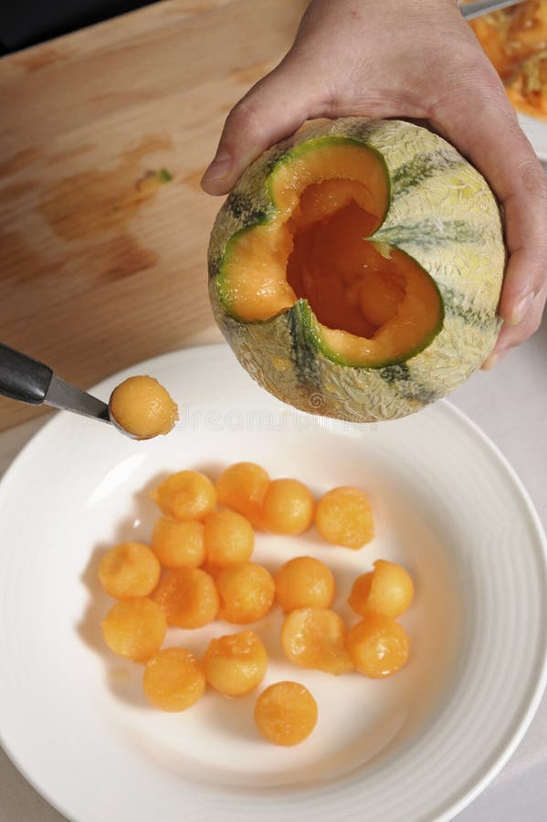 Making Melon Balls with Scoop, Closeup Stock Photo Image of closeup, eating 194990888