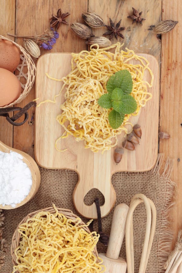 Making Noodle With Wheat Flour And Egg For Cooking. Stock Photo Image