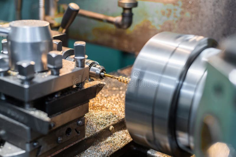 Making Nuts from a Bronze Hexagon on a Lathe Stock Photo Image of