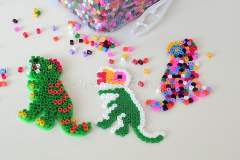 Colorful Iron Beads in a Box, Art Toys Created from Them and White