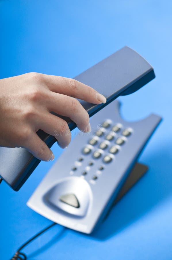 Making a Phone Call at the Office Stock Photo Image of electronics