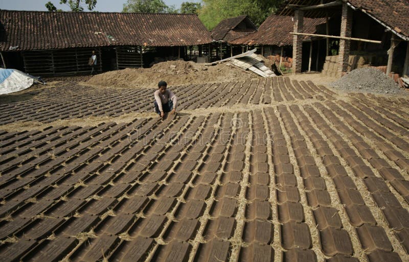 Making roof tile editorial stock image. Image of housing 35343009