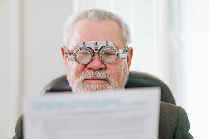 Making a Selection of Lenses, Diagnosing a Elderly Man S Vision. Stock