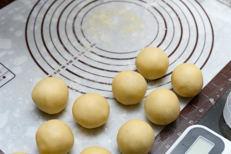 Making Traditional Chinese Snack Preserved Egg Cakes at Home Stock