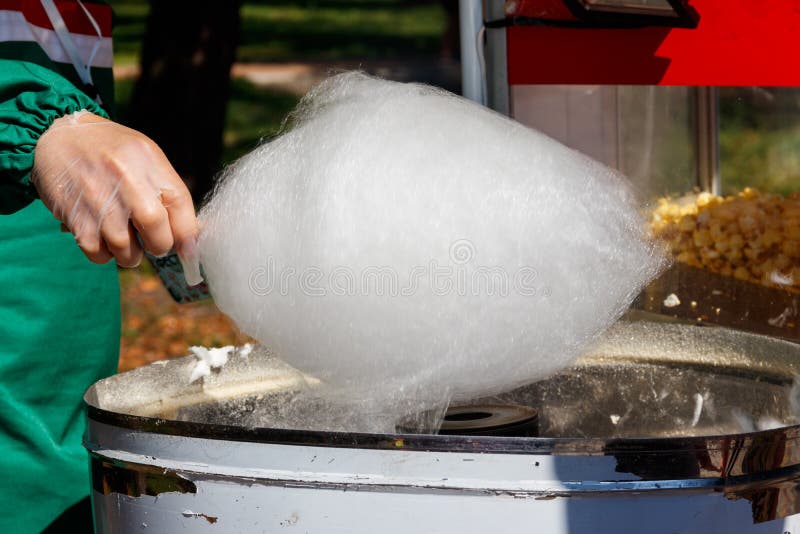 Making White Cotton Candy in Cotton Candy Machine Closeup Stock Image