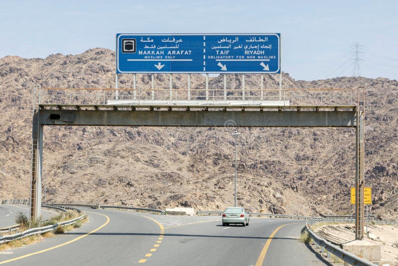 makkah-saudi-arabia-february-road-sign-vicinity-mecca-non-muslims-do-have-to-drive-around-holy-city-mecca-215937434.jpg