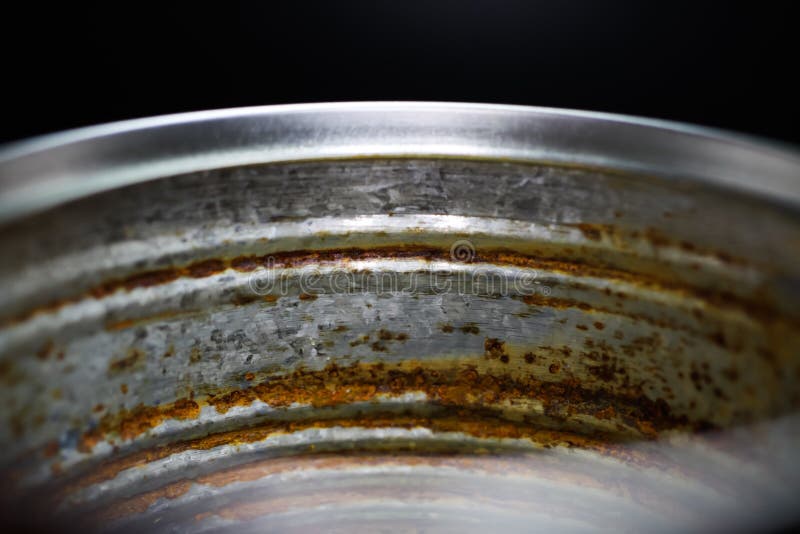 Makro closeup inside metal food can with rusty corroded surface royalty free stock photography