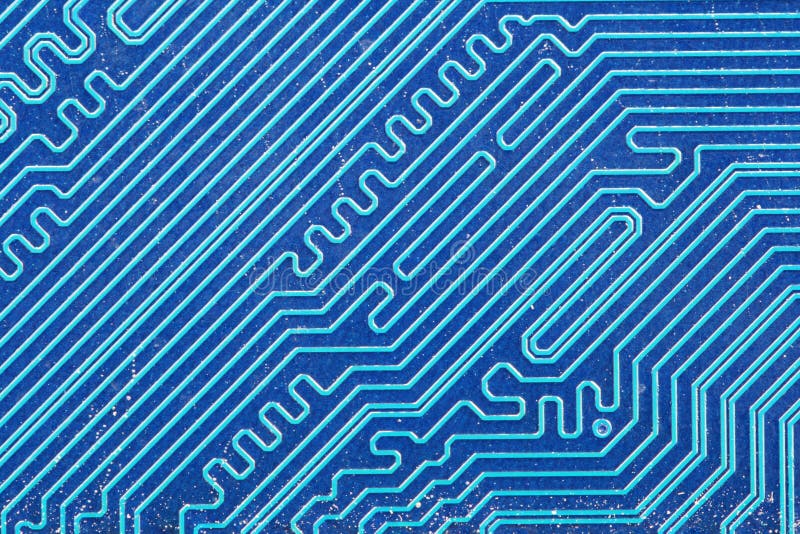 Blue electric printed circuit board background macro image. Blue electric printed circuit board background macro image