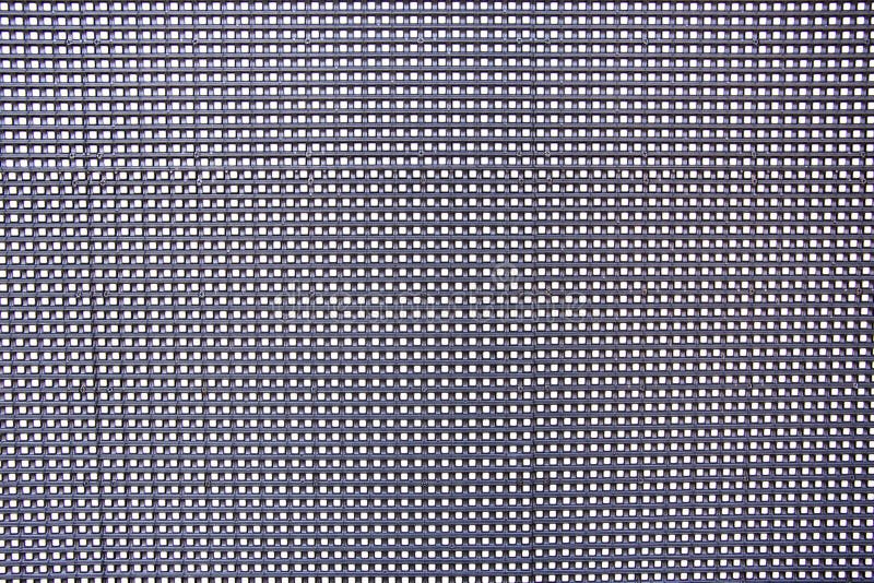 Macro shot of the surface of the LSD screen. A texture to overlay to your still photo or footage to simulate an lcd pc screen shot or video. Macro detail of the dot grid. .Macro shot of the surface of the LSD screen. A texture to overlay to your still photo or footage to simulate an lcd pc screen shot or video. Macro detail of the dot grid