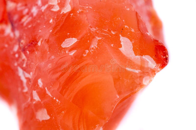 Makromineralsteinkarneol auf weißem Hintergrund stockfoto