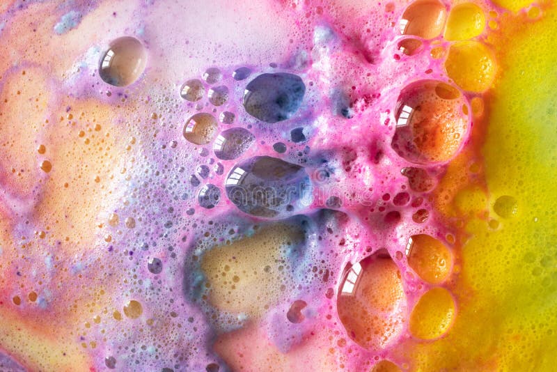 Makroregnbågebubblor av badet bombarderar textur arkivfoto Makroregnbågebubblor av badet bombarderar textur arkivfoto