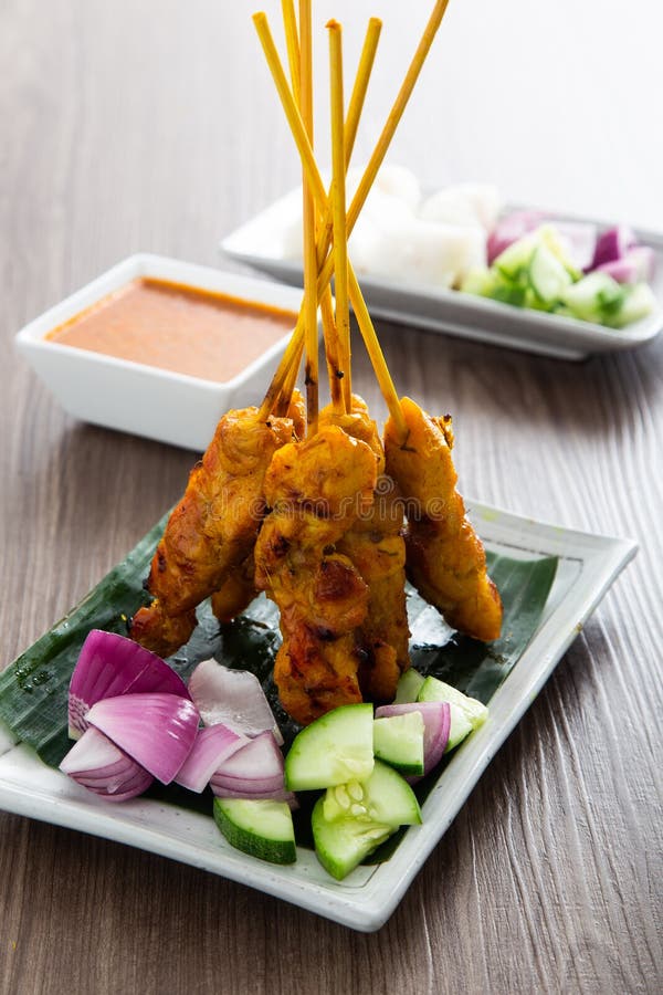 Malaysian Chicken Satay with Delicious Peanut Sauce Stock Photo - Image ...