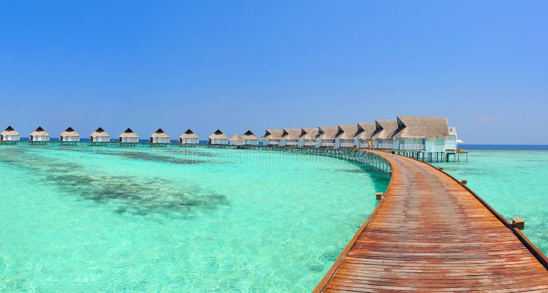 Maldives bungalows panorama royalty free stock photography