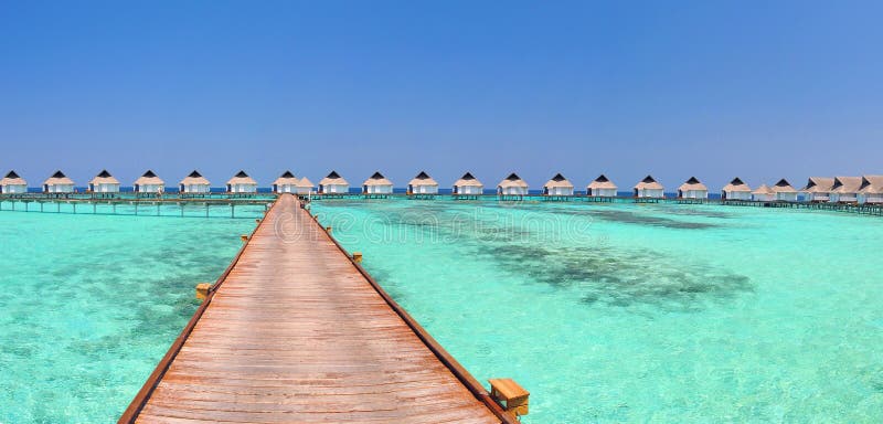 Maldives bungalows panorama stock photo