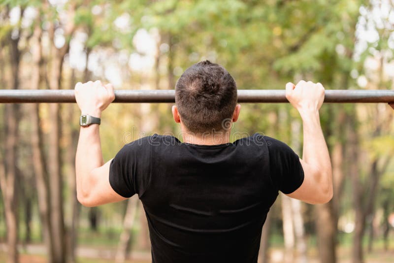 Male Athlete Doing Pull Ups Stock Image Image of activity, horizontal 219753235