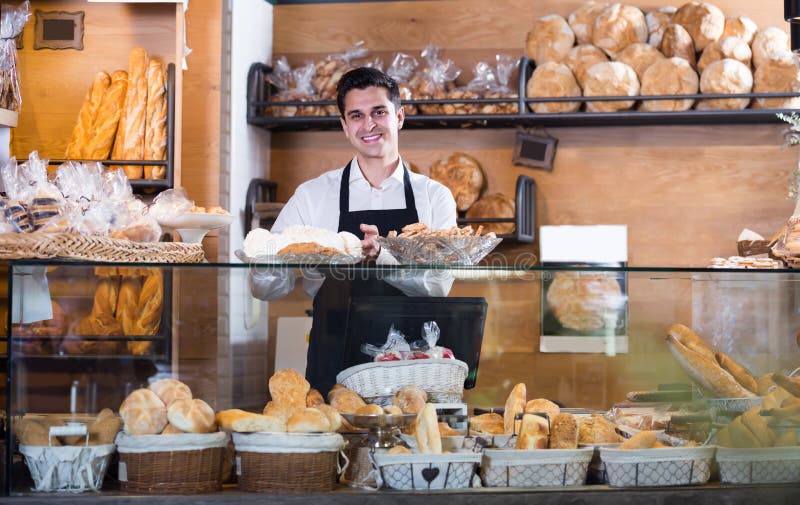 Male baker at bakery stock image. Image of occupation 71711573