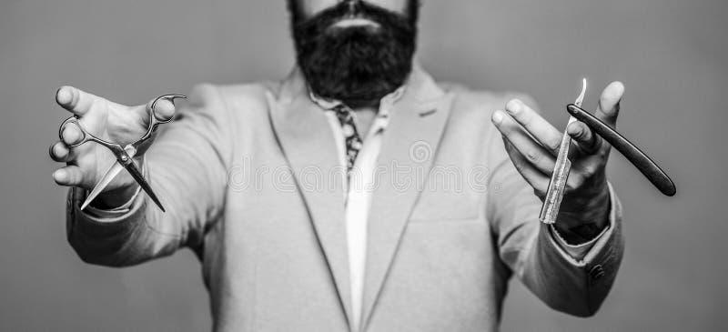Male in barbershop. Mens haircut in barber shop. Barber scissors and straight razor, barber shop. Mens haircut, shaving stock images Male in barbershop. Mens haircut in barber shop. Barber scissors and straight razor, barber shop. Mens haircut, shaving stock images