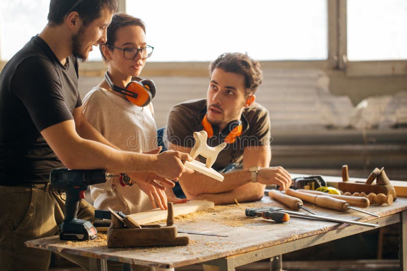 Carpenter Training Female Apprentice To Use Plane Stock Photo Image