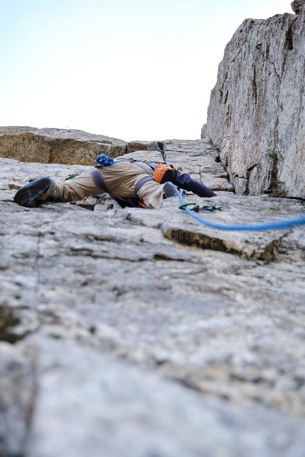 Male Climber Climbing a Vertical Mountain Wall Stock Photo Image of