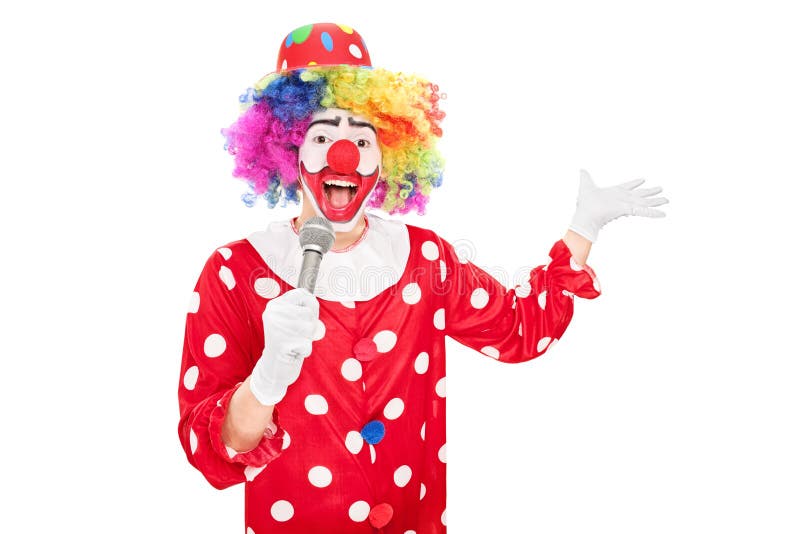 Male clown speaking on a microphone stock photography